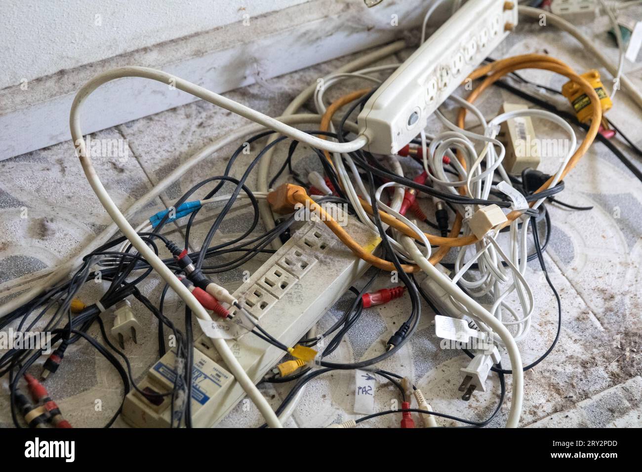 Messy home electric nest all tangled up Stock Photo