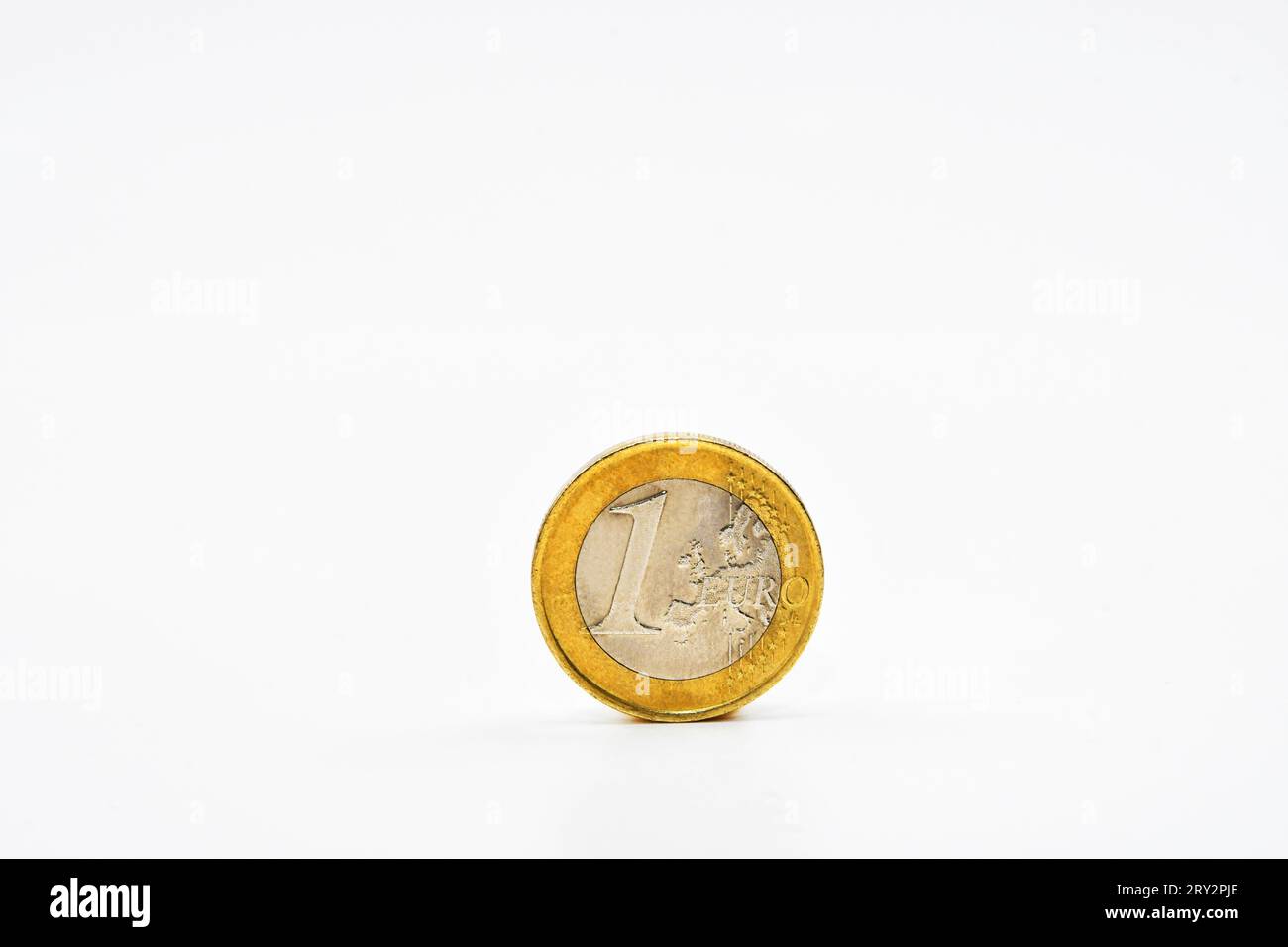 One Euro coin isolated on a plain white background. Copy space. Stock Photo