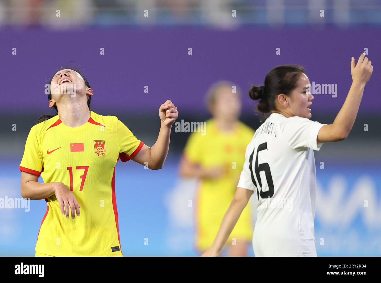 Hangzhou, China's Zhejiang Province. 28th Sep, 2023. Yan Jinjin (L) of ...