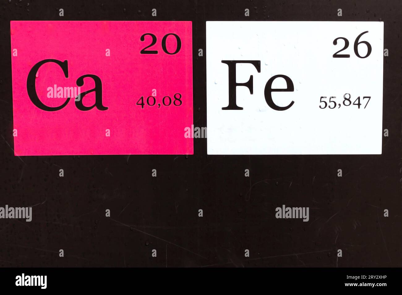 Chemical elements calcium and ferrum.Names and abbreviation of chemical