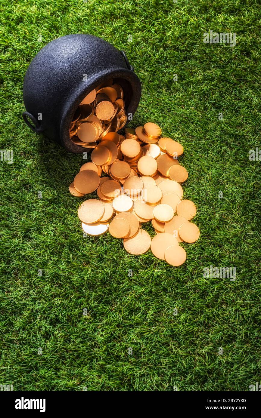 Looking down on a black wrought iron kettle pot that has been knocked