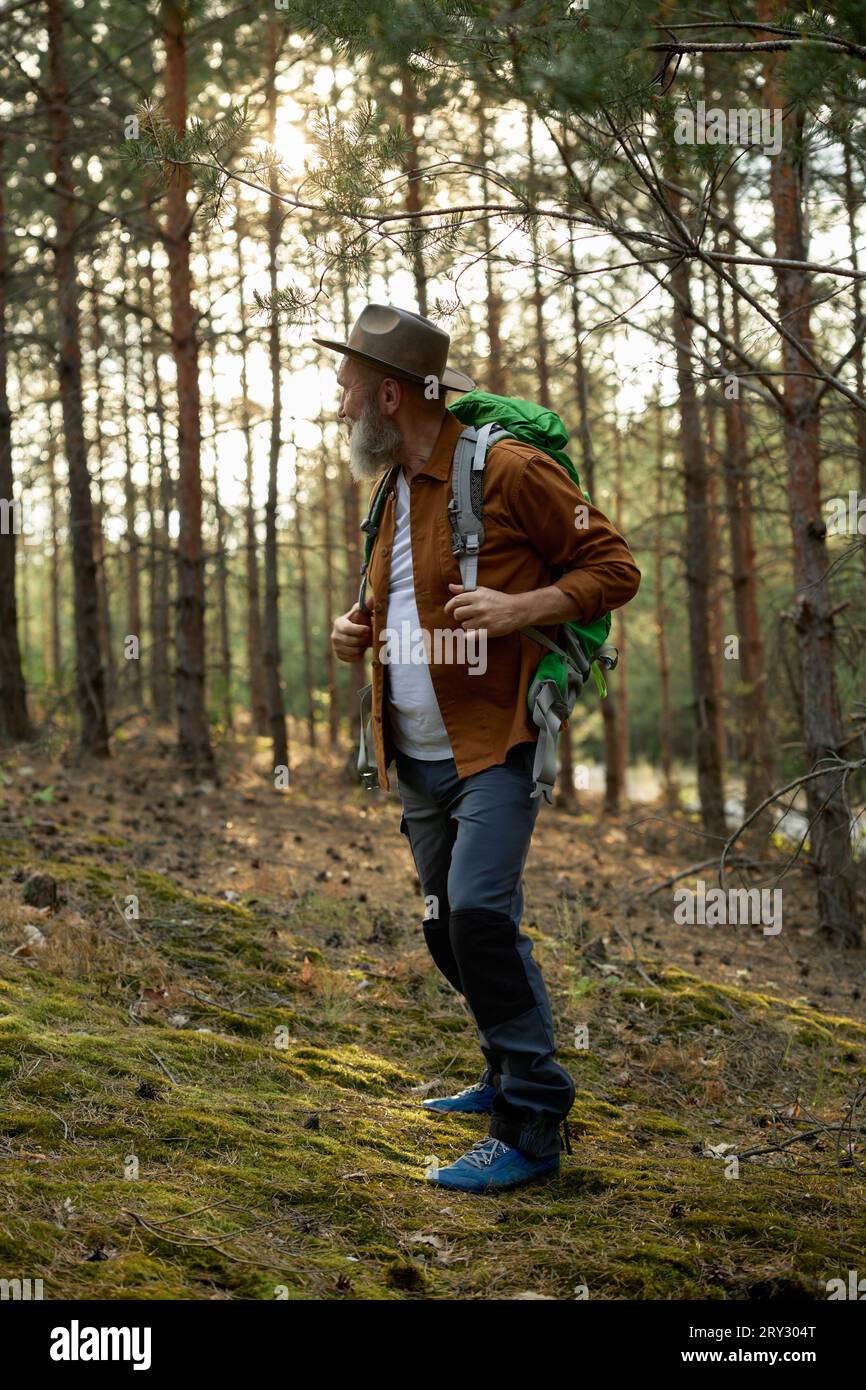 Male explorer backpack walking hi-res stock photography and images - Alamy
