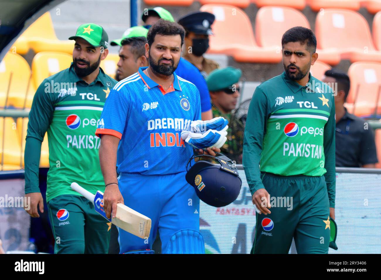 India's Rohit Sharma and Babar Azam of Pakistan coming to ground during the Asia Cup Group A match between India and Pakistan Stock Photo