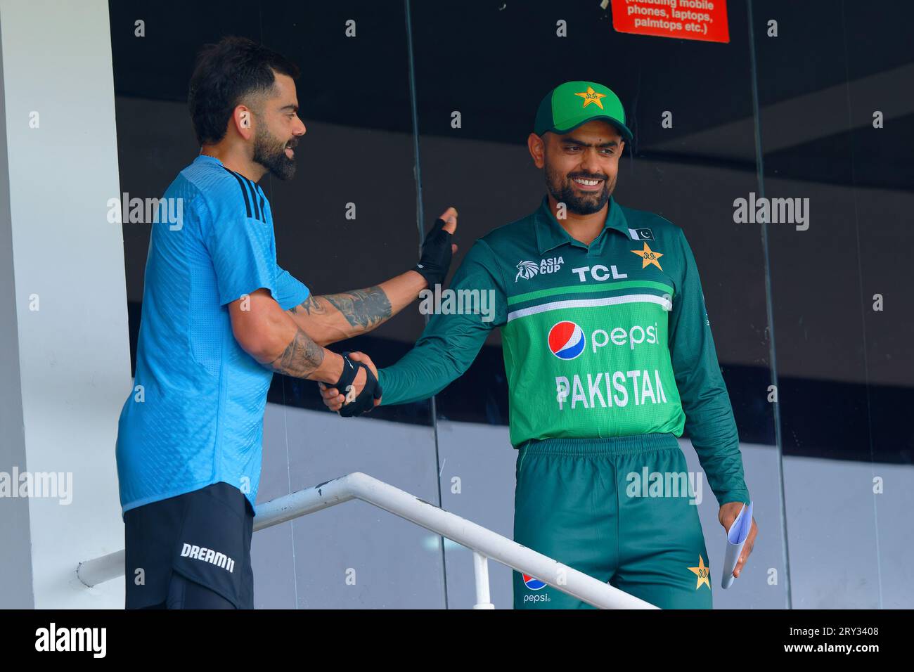 India's Virat Kohli and Babar Azam of Pakistan Shake hands before the toss of Asia Cup 2023 Stock Photo