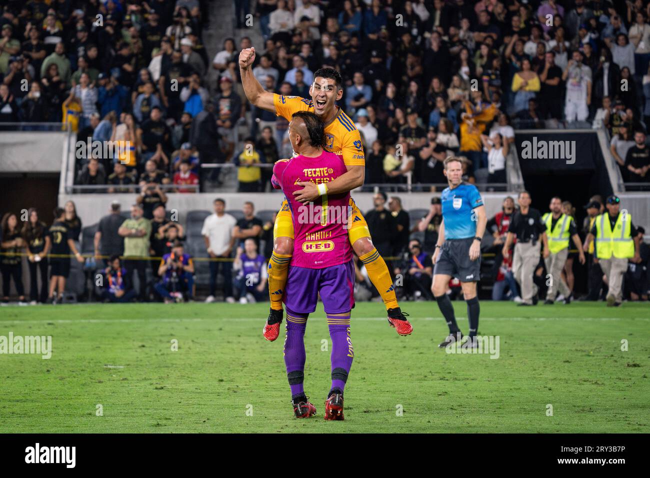 Tigres UANL defender Jesús Angulo (27) celebrates after converting the winning penalty with goalkeeper Nahuel Guzmán (1) during the Campeones Cup 2023 Stock Photo