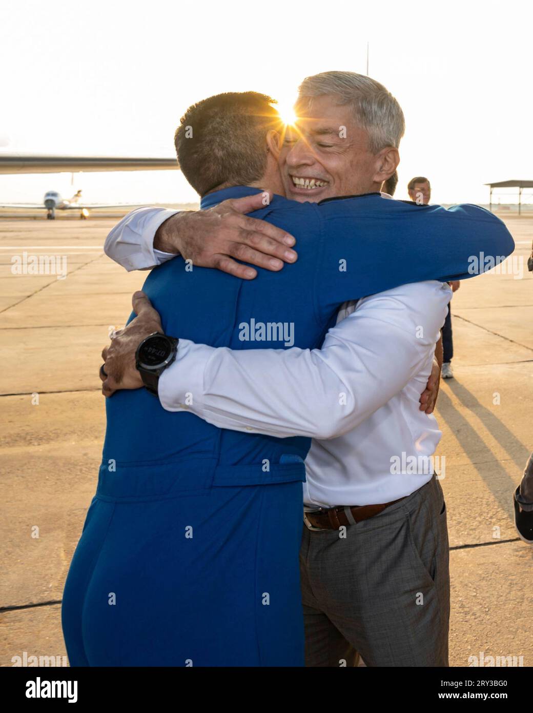 Houston, United States. 28th Sep, 2023. NASA astronaut Frank Rubio, left, embraces fellow astronaut Mark Vande Hei, right, upon arriving home to the Johnson Space Center at Ellington Field, September 28, 2023 in Houston, Texas. Rubio set a new American record for the 371 days in space beating the previous record set by Mark Vande Hei on the International Space Station. Credit: Robert Markowitz/NASA/Alamy Live News Stock Photo