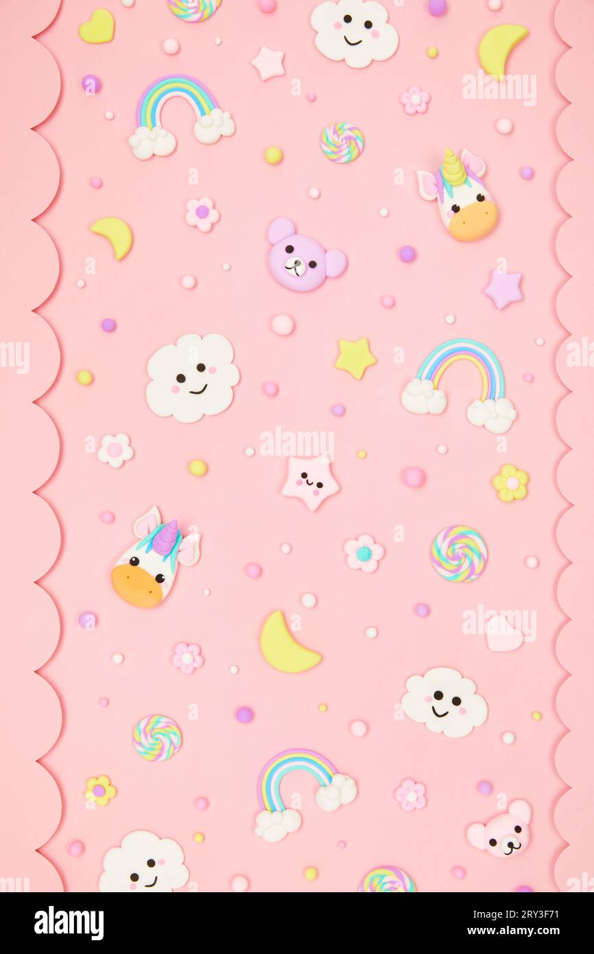 pastel pink kawaii background with cute cartoon animals, unicorns