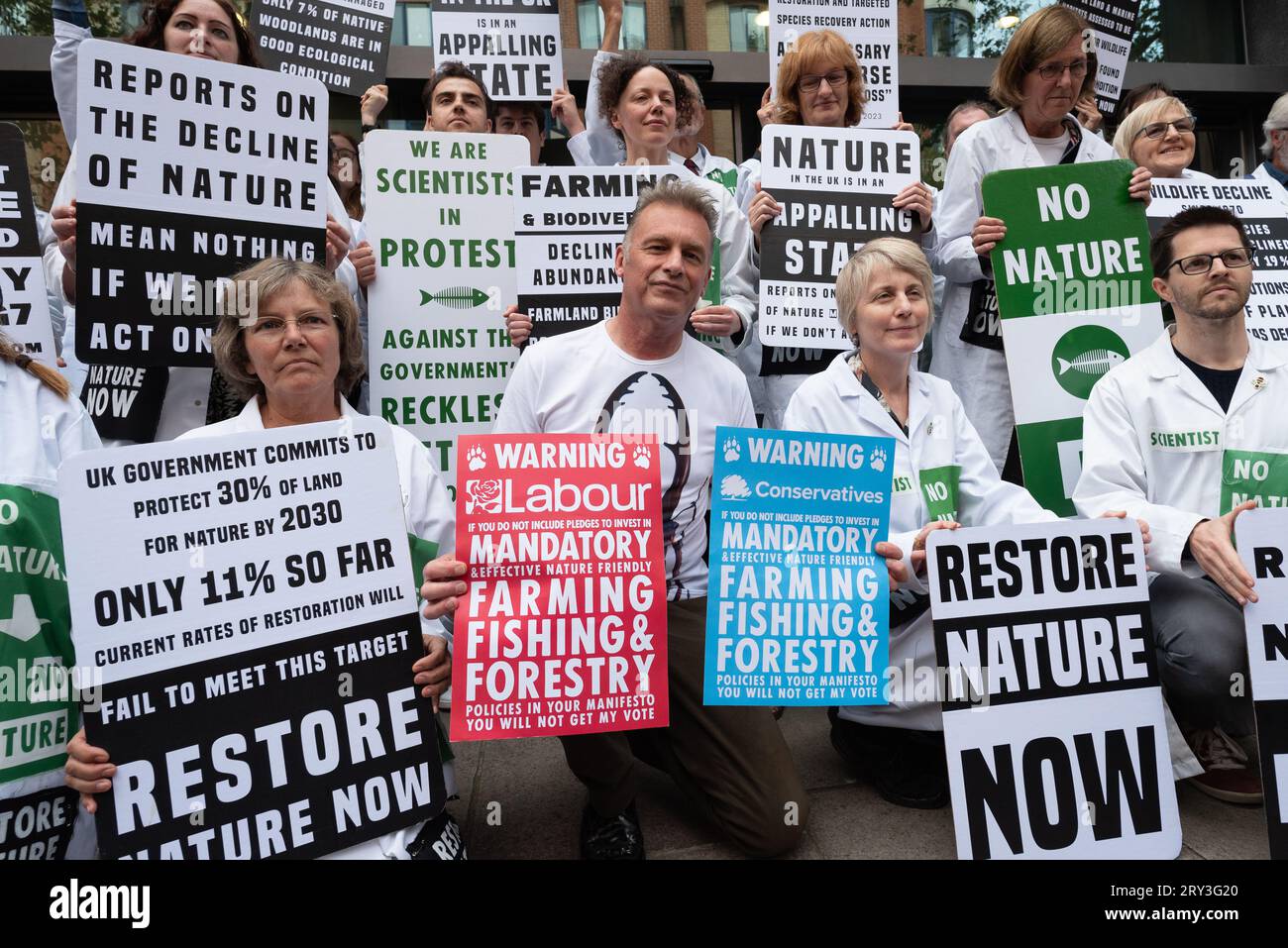 London, UK. 28 September, 2023. Naturalist and TV presenter Chris Packham joins scientists as a coalition of environmental groups rally at the Department for Environment, Food and Rural Affairs calling on government to take action to halt what is described as an 'escalating biodiversity crisis' in the UK. It follows publication of the 'State of Nature' report which assessed the UK is now one of the most nature-depleted countries on Earth, largely due to agricultural practices and climate change. Credit: Ron Fassbender/Alamy Live News Stock Photo