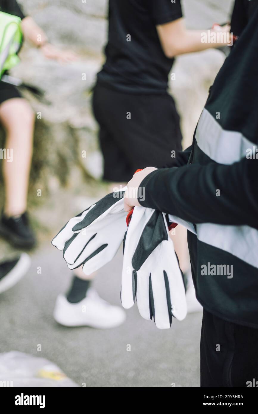 Midsection of boy wearing glove Stock Photo