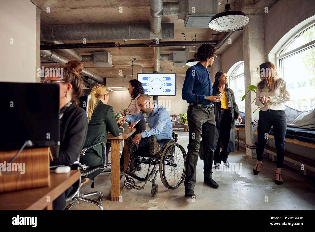 Multiracial business colleagues working at creative office Stock Photo