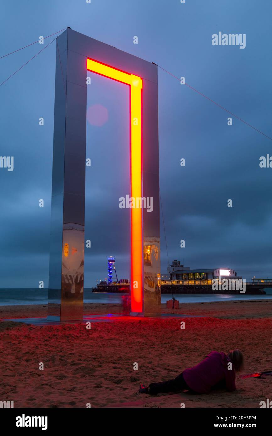 Bournemouth, Dorset, UK. 28th September 2023. Portal by Lucid Creates appears on Bournemouth beach as part of the Arts by the Sea Festival. The 15-metre towering illuminated archway structure is lined with shifting lights that create a mesmerising and ethereal display, where visitors can walk through the archway lined with lights that glow and create displays.  Credit: Carolyn Jenkins/Alamy Live News Stock Photo