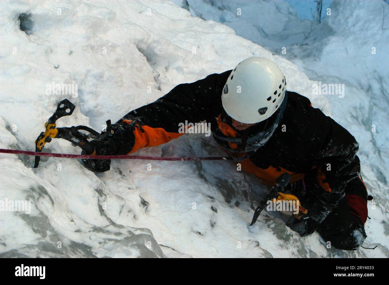 Mountaineer climbing icefall hi-res stock photography and images - Alamy