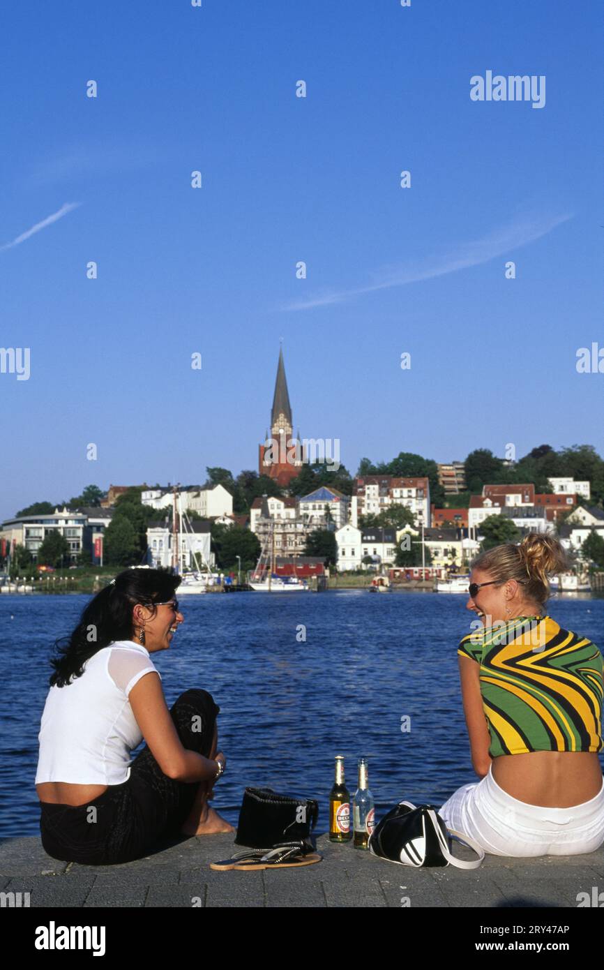 Two girls at the harbour of Flensburg, Schleswig-Holstein, Germany Stock  Photo - Alamy