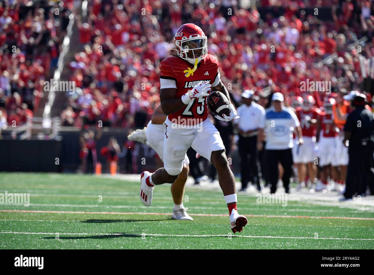 Louisville running back Jawhar Jordan (25) runs for the end zone during