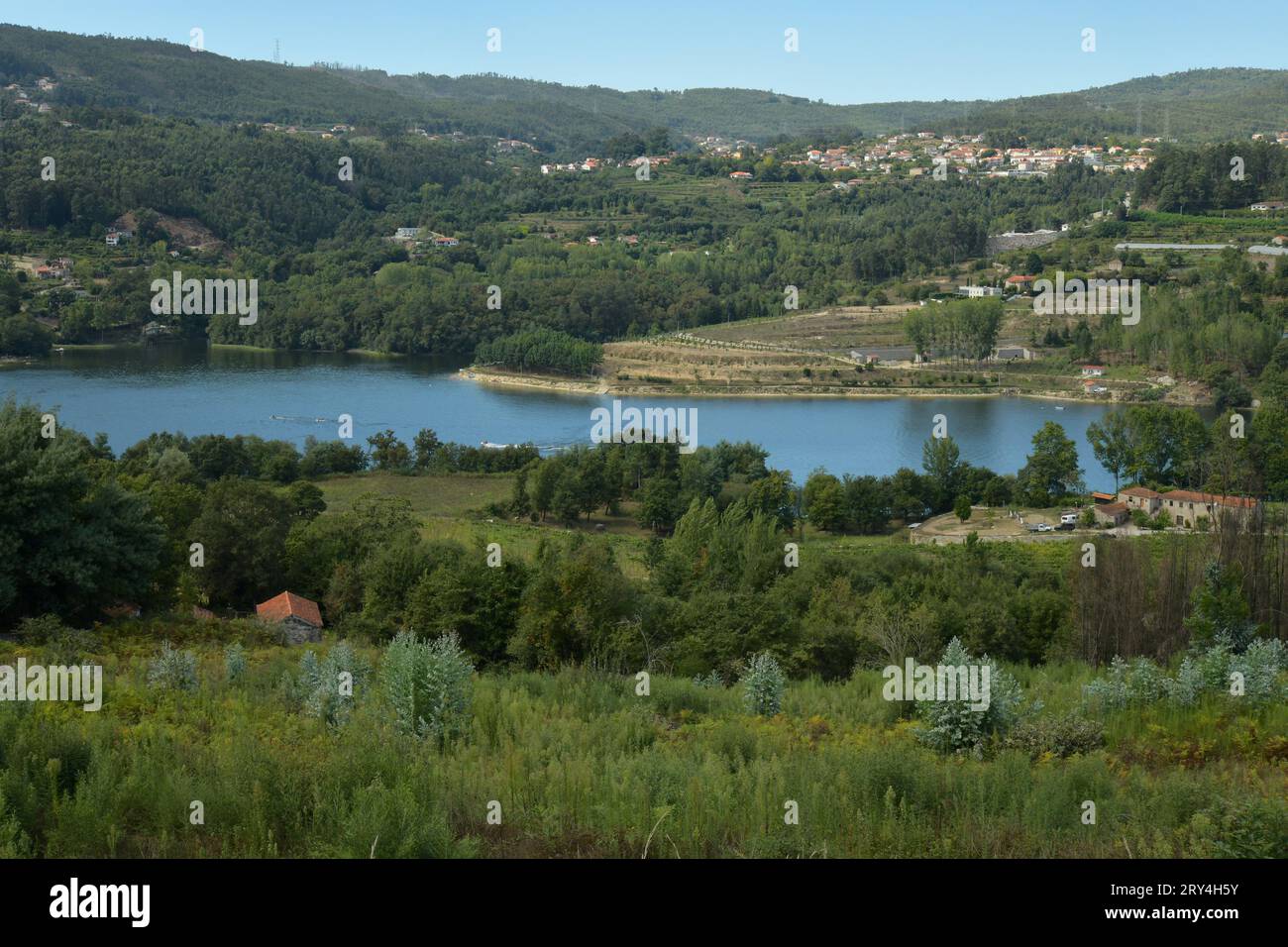 vineyards and charming native farms cling to the steep sides of the ...