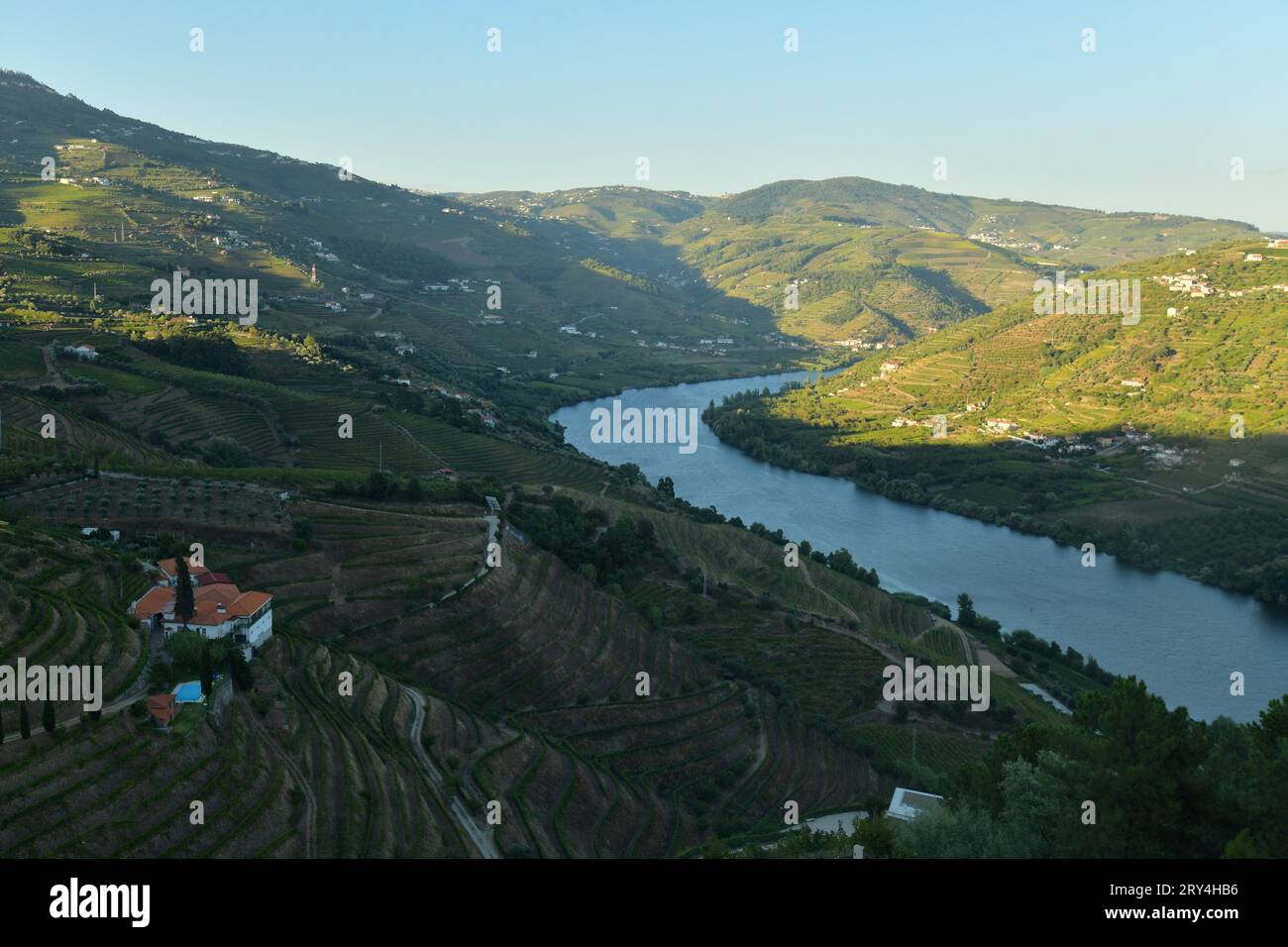 vineyards and charming native farms cling to the steep sides of the ...