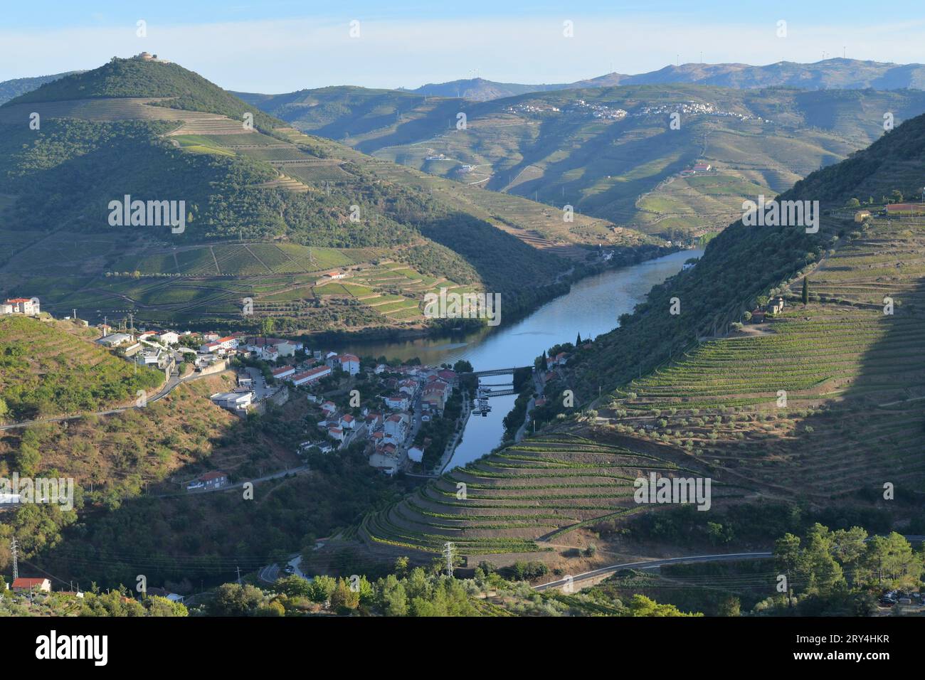 vineyards and charming native farms cling to the steep sides of the ...