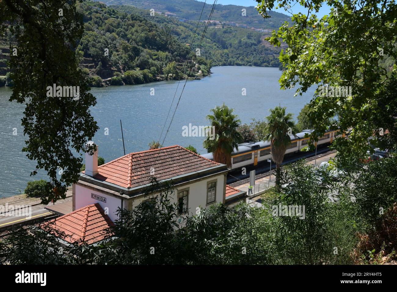 vineyards and charming native farms cling to the steep sides of the ...