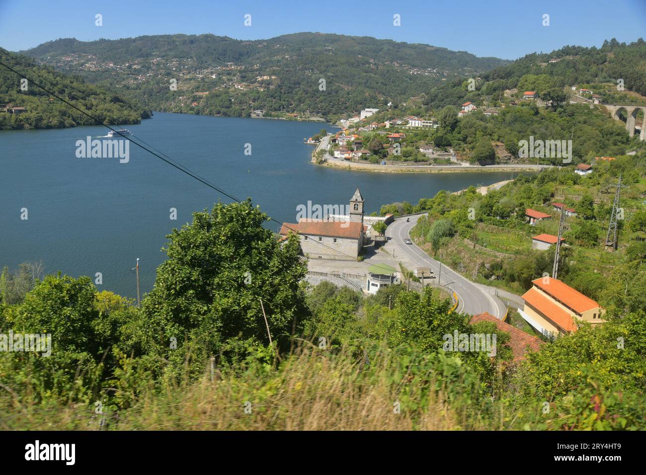 vineyards and charming native farms cling to the steep sides of the ...