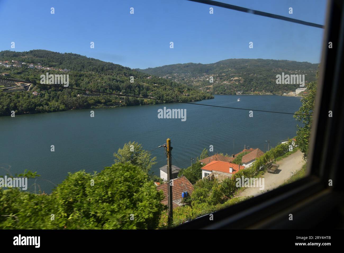 vineyards and charming native farms cling to the steep sides of the ...