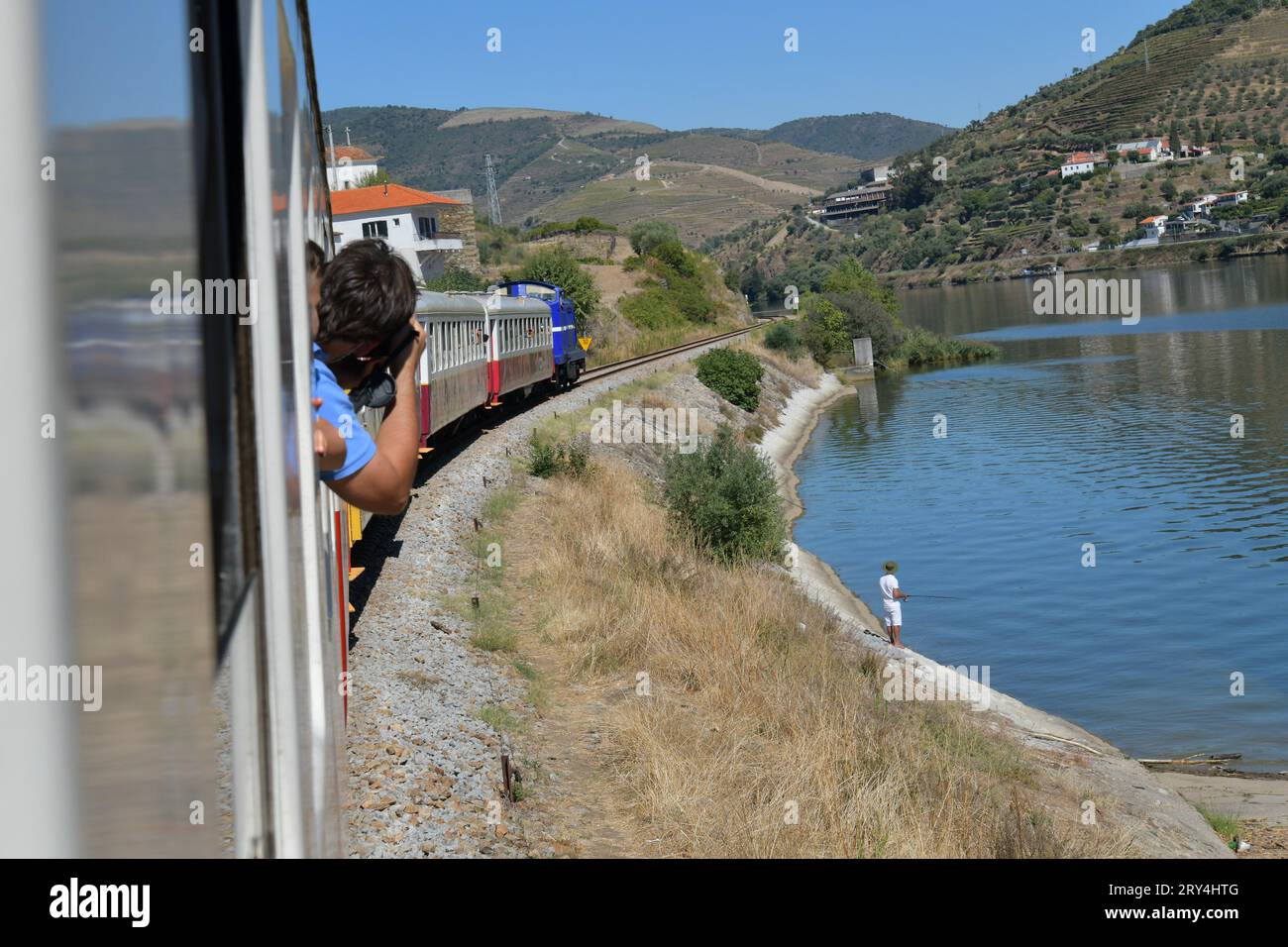 vineyards and charming native farms cling to the steep sides of the ...