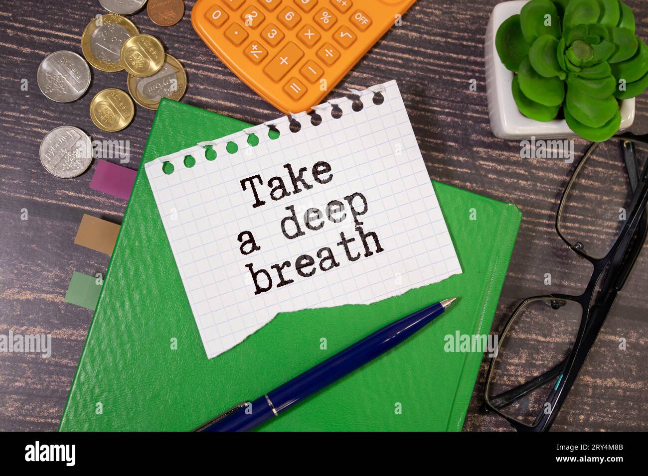 text Take a deep breath on white paper. Stock Photo