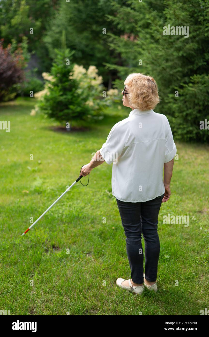 Rear view elderly blind hi-res stock photography and images - Alamy