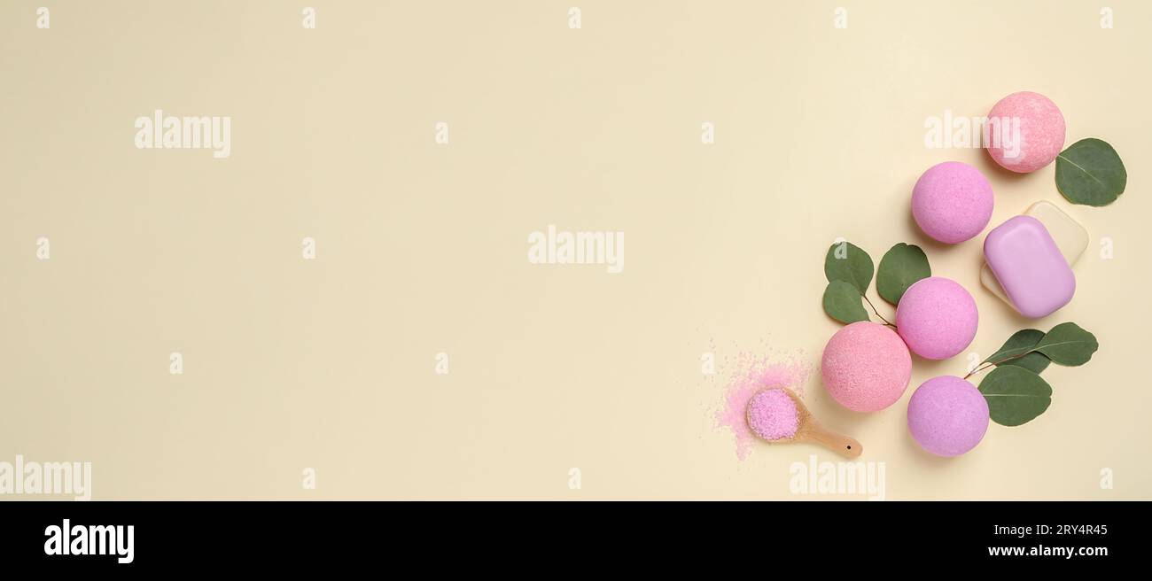 Many different bath bombs on beige background, flat lay. Space for text Stock Photo