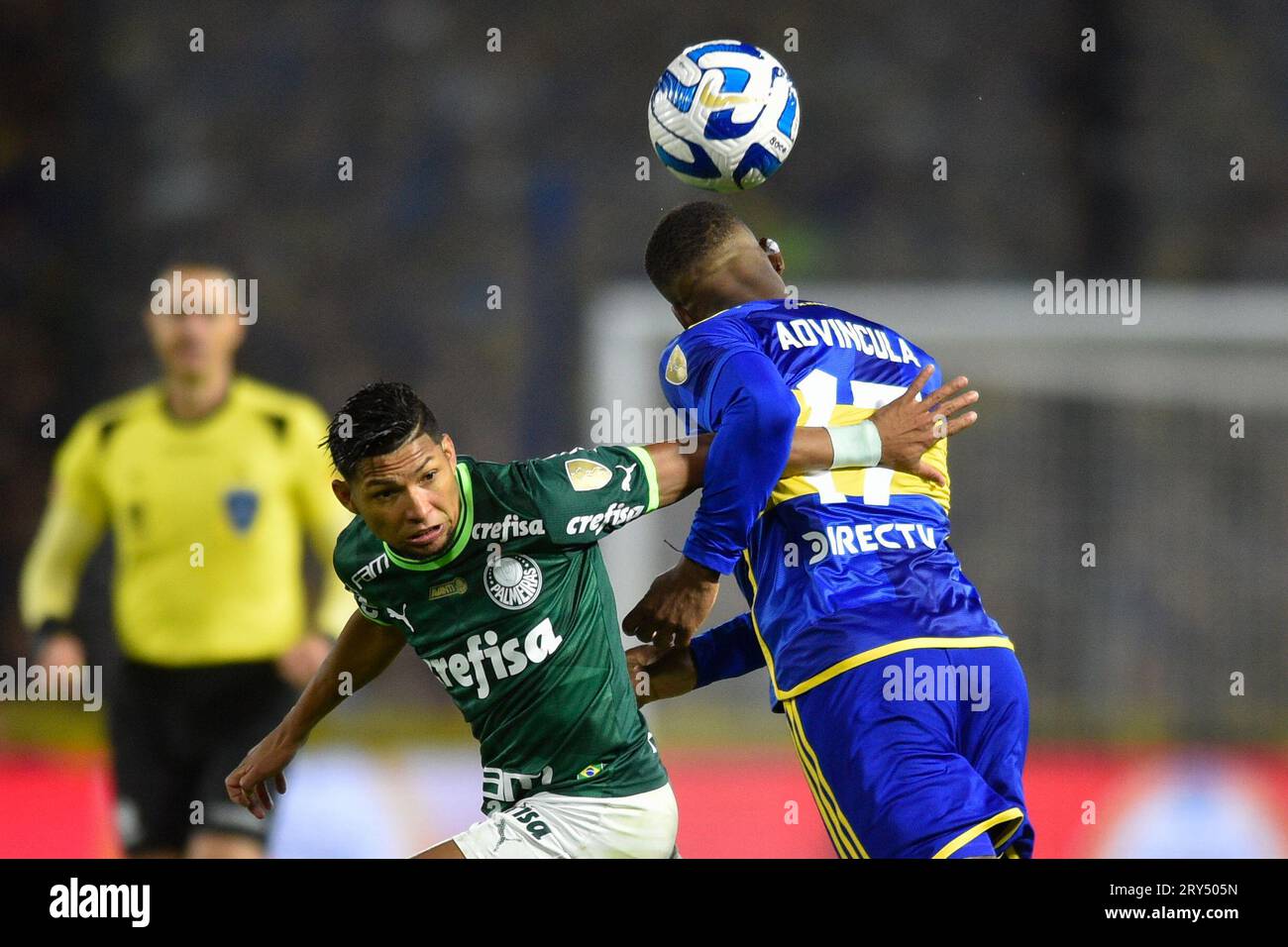 Edinson Cavani of Argentina's Boca Juniors heads the ball during a Copa  Libertadores quarterfinal second leg soccer match against Argentina's  Racing Club at Presidente Peron stadium in Buenos Aires, Argentina,  Wednesday, Aug.