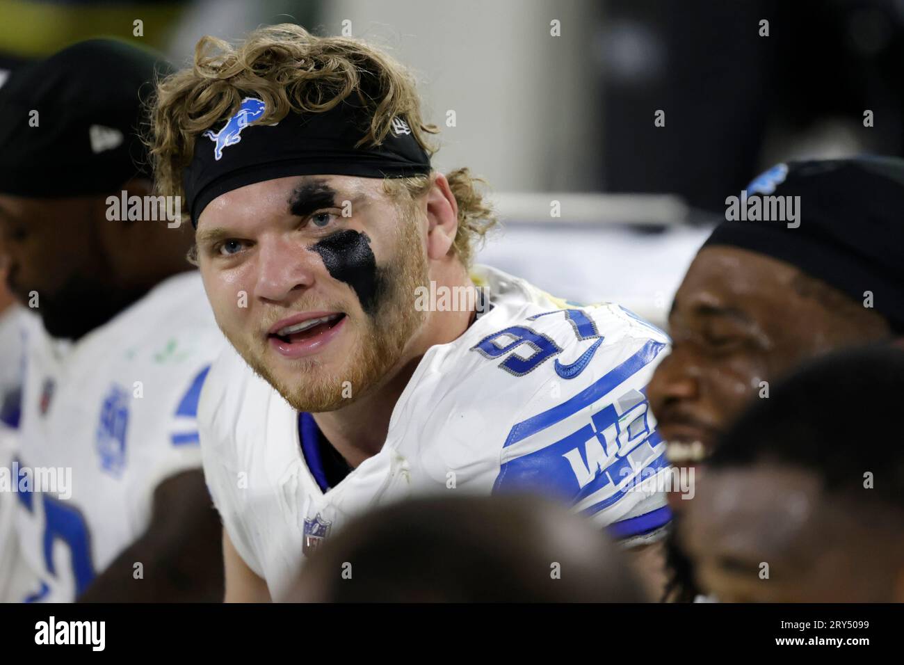 Detroit Lions defensive end Aidan Hutchinson (97) sits on the bench during  the first half of an NFL football game against the Green Bay Packers,  Thursday, Sept. 28, 2023, in Green Bay,