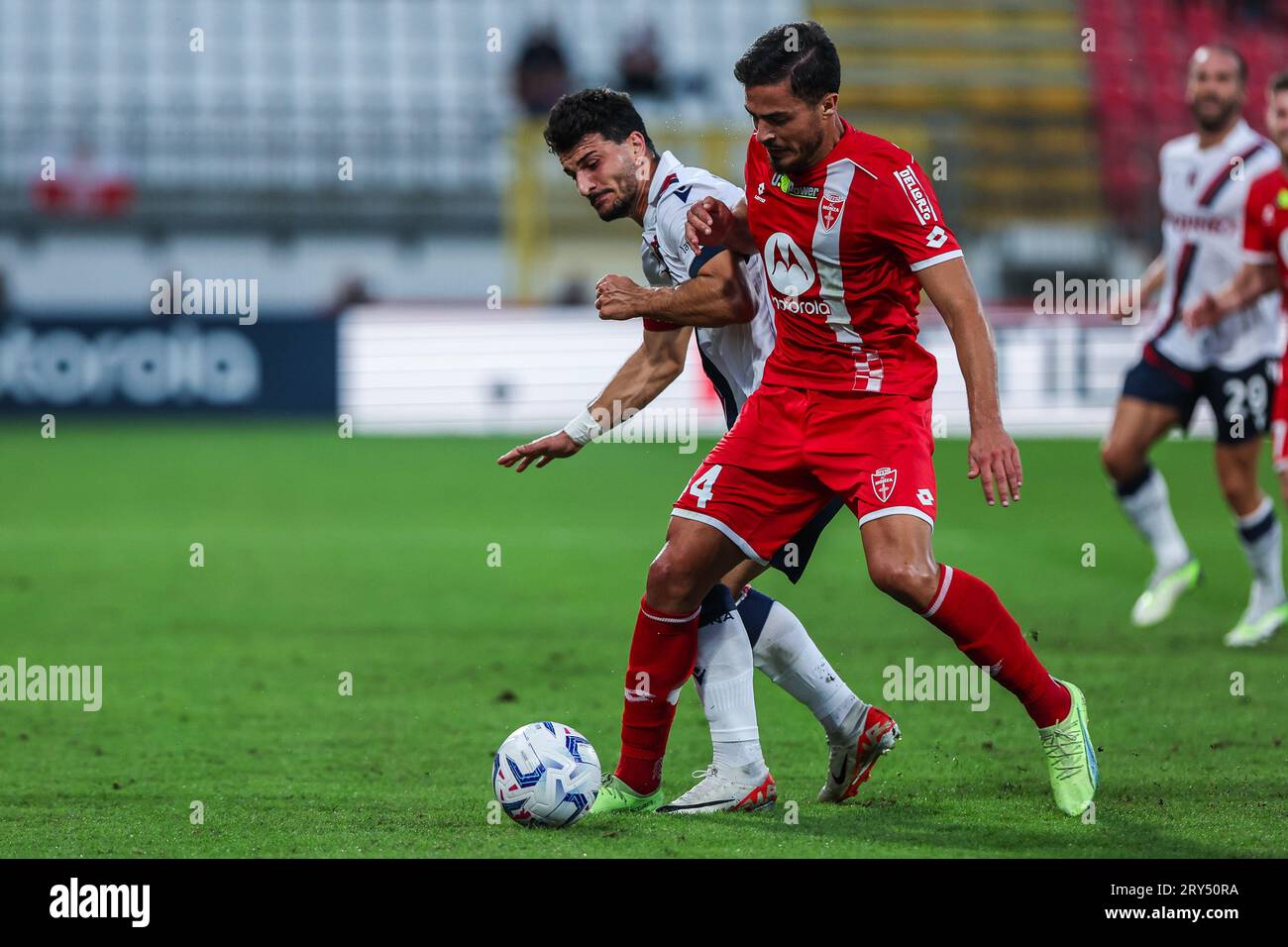 Monza, Italy. 28th Sep, 2023. Andrea Carboni of AC Monza (R) and