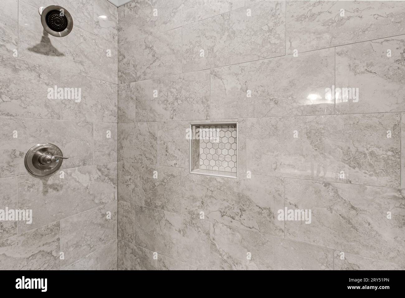 Granite Stock Primary Bathroom Interior with Built In Shelf with Hexagon Tiles. Copyspace Stock Photo