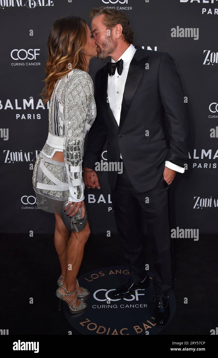 Brooke Burke and Scott Rigsby arrive at the Zodiac Ball, Thursday, Sept