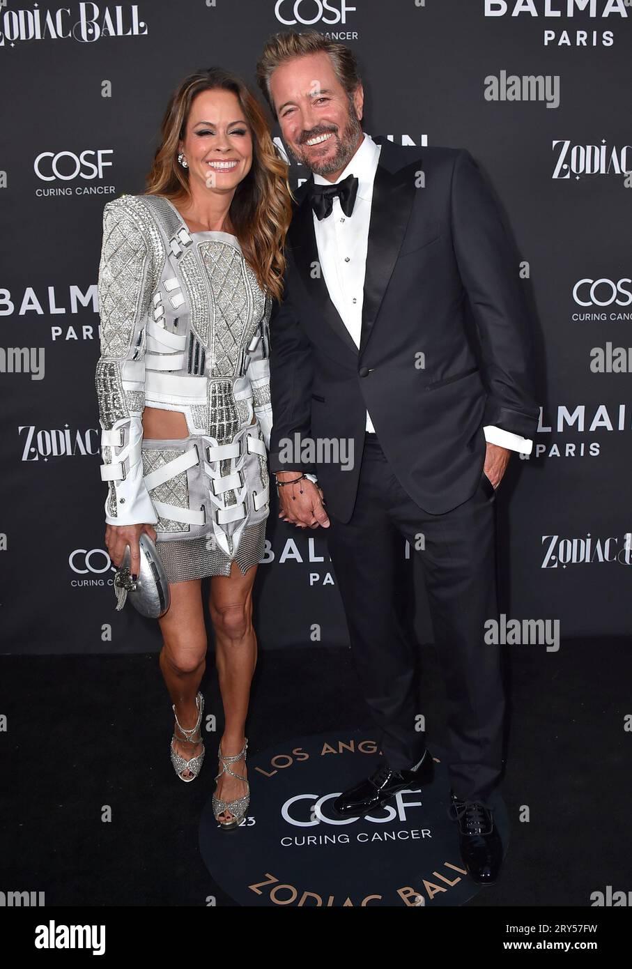 Brooke Burke and Scott Rigsby arrive at the Zodiac Ball, Thursday, Sept