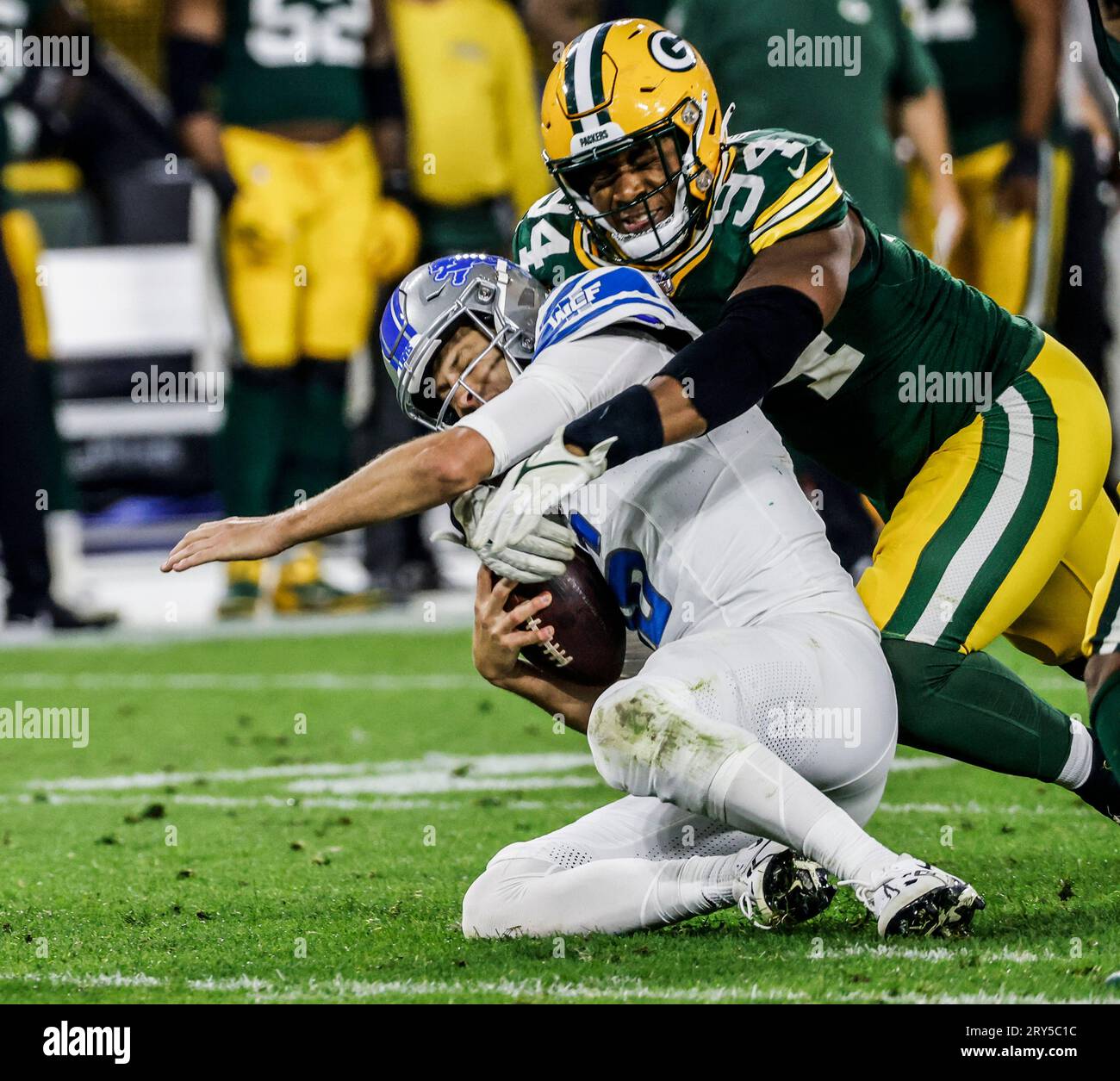 Green Bay, United States. 28th Sep, 2023. Green Bay Packers defensive end Karl Brooks (R) sacks Detroit Lions quarterback Jared Goff (L) during their NFL game at Lambeau Field in Green Bay, Wisconsin on Thursday, September 28, 2023. The Lions defeated the Packers 20-34. Photo by Tannen Maury/UPI Credit: UPI/Alamy Live News Stock Photo
