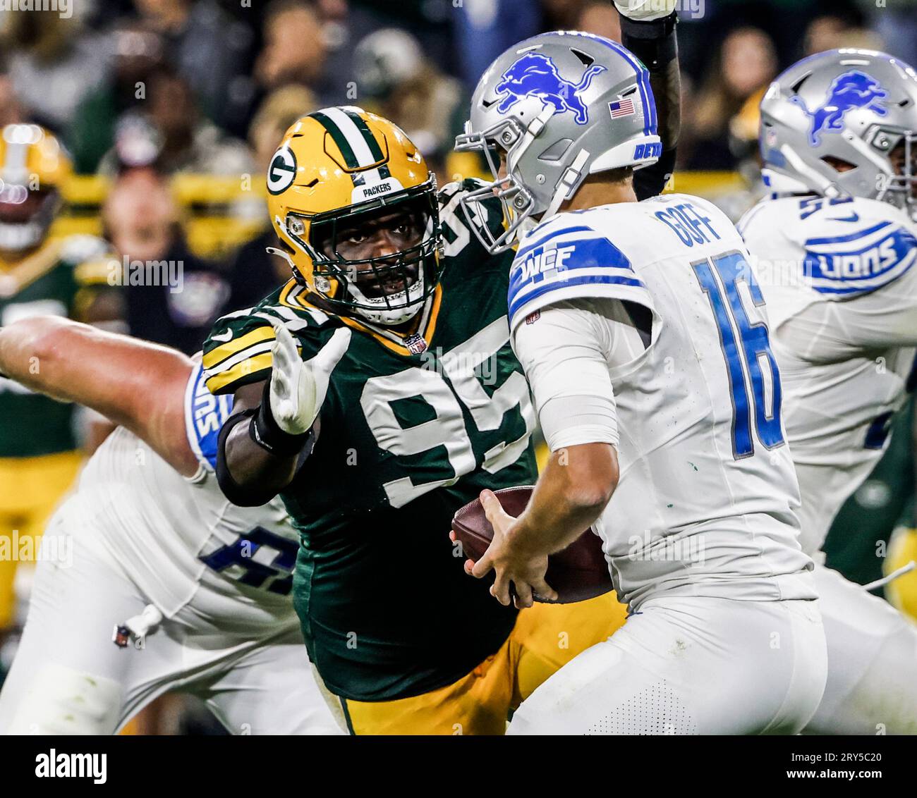 Green Bay, United States. 29th Sep, 2023. Green Bay Packers defensive tackle Devonte Wyatt (L) sacks Detroit Lions quarterback Jared Goff (R) during their NFL game at Lambeau Field in Green Bay, Wisconsin on Thursday, September 28, 2023. The Lions defeated the Packers 20-34. Photo by Tannen Maury/UPI Credit: UPI/Alamy Live News Stock Photo