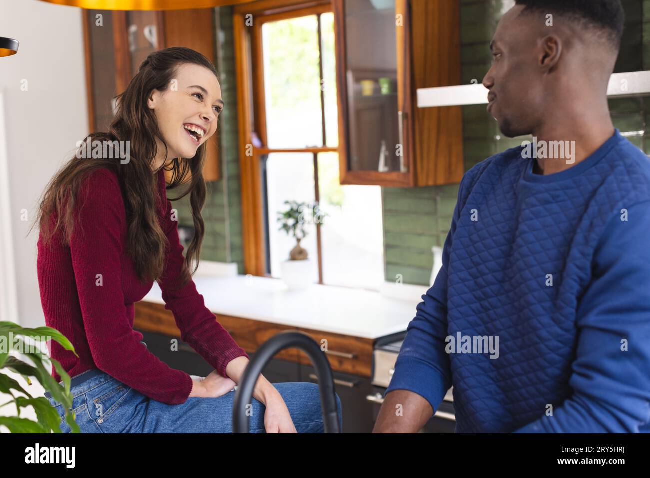 Happy family is talking at home hi-res stock photography and images - Alamy