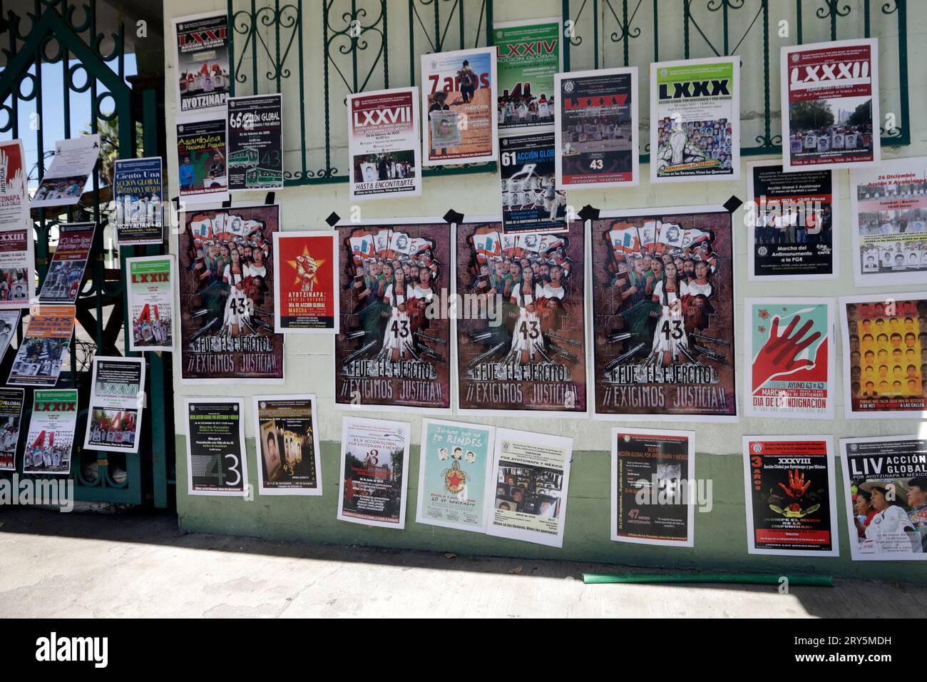 Naucalpan, Mexico. 28th Sep, 2023. September 28, 2023, Naucalpan, State of Mexico, Mexico: Door 1 of Military Camp 1 is plastered with propaganda demanding justice for the missing students of Ayotzinapa at the press conference outside Military Camp 1 in the municipality of Naucalpan, State of Mexico. on September 28, 2023 in Naucalpan, State of Mexico, Mexico (Photo by Luis Barron/Eyepix Group). Credit: Eyepix Group/Alamy Live News Stock Photo