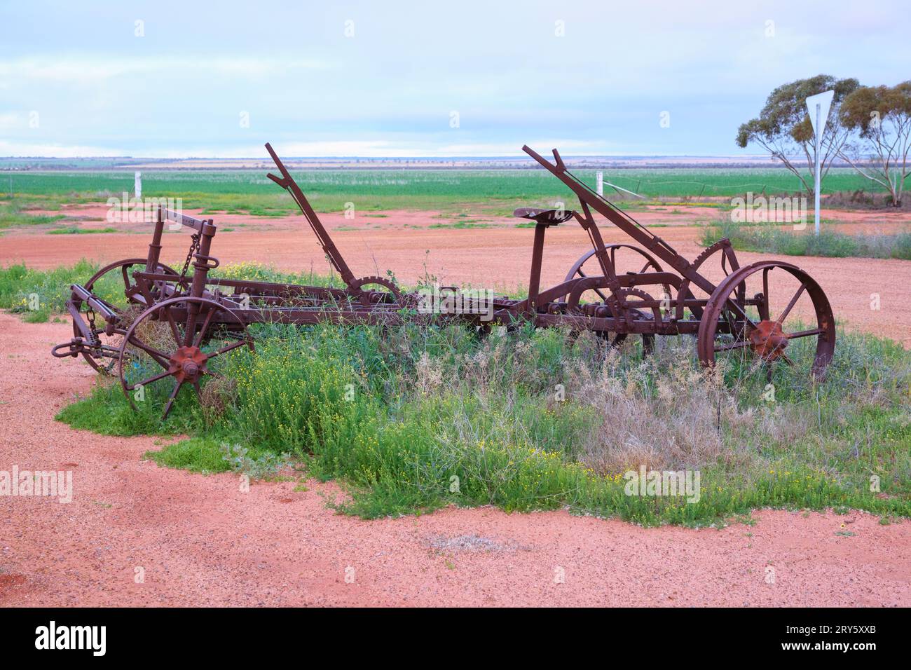 An old, rusty plough on the outskirts of Mukinbudin in the Wheatbelt region of Western Australia. Stock Photo