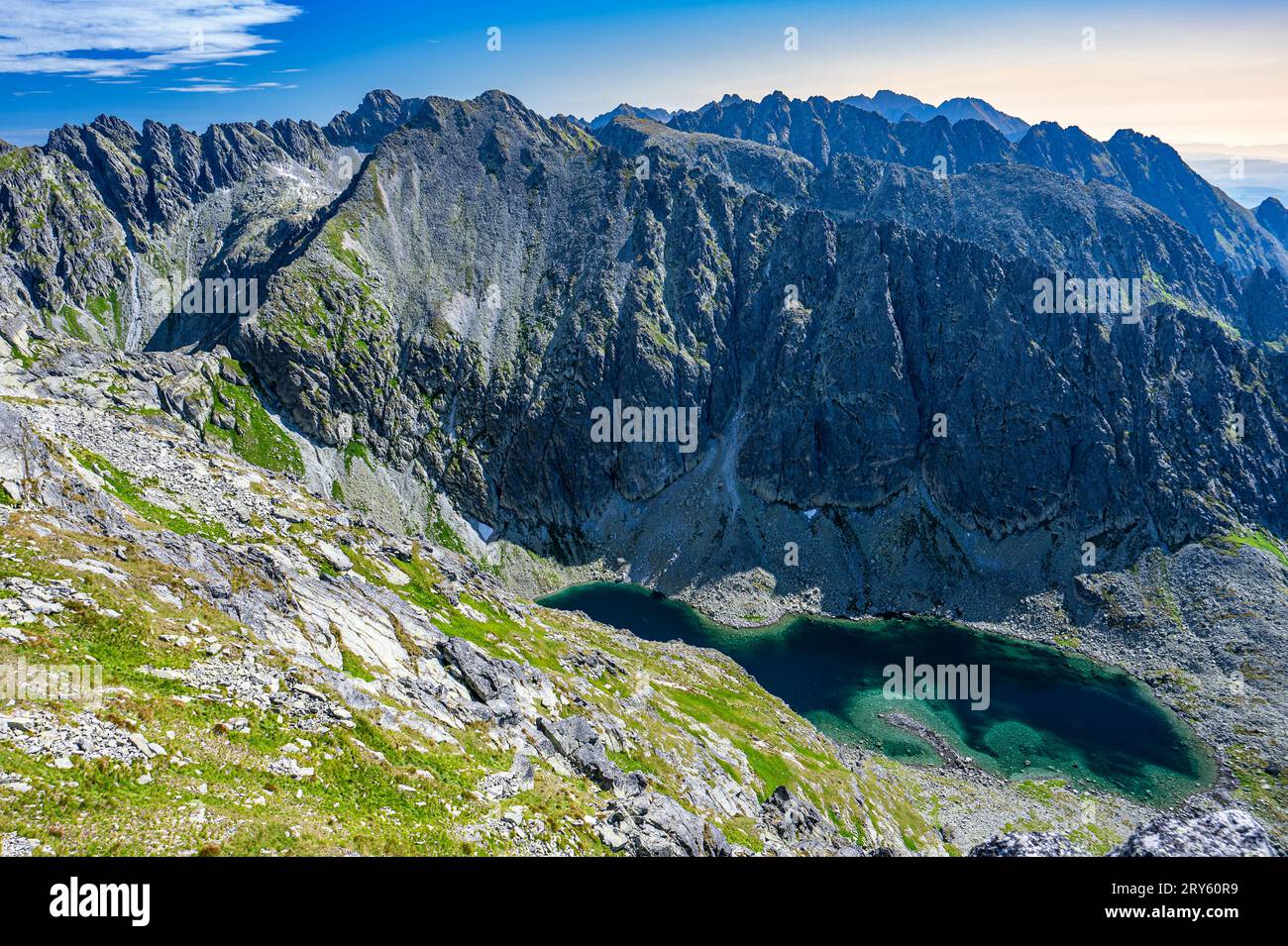 A view of the Tatra Mountains with the Nizne Krivanske Zelene Pleso, Krivan Green Lake, Slovakia. Stock Photo