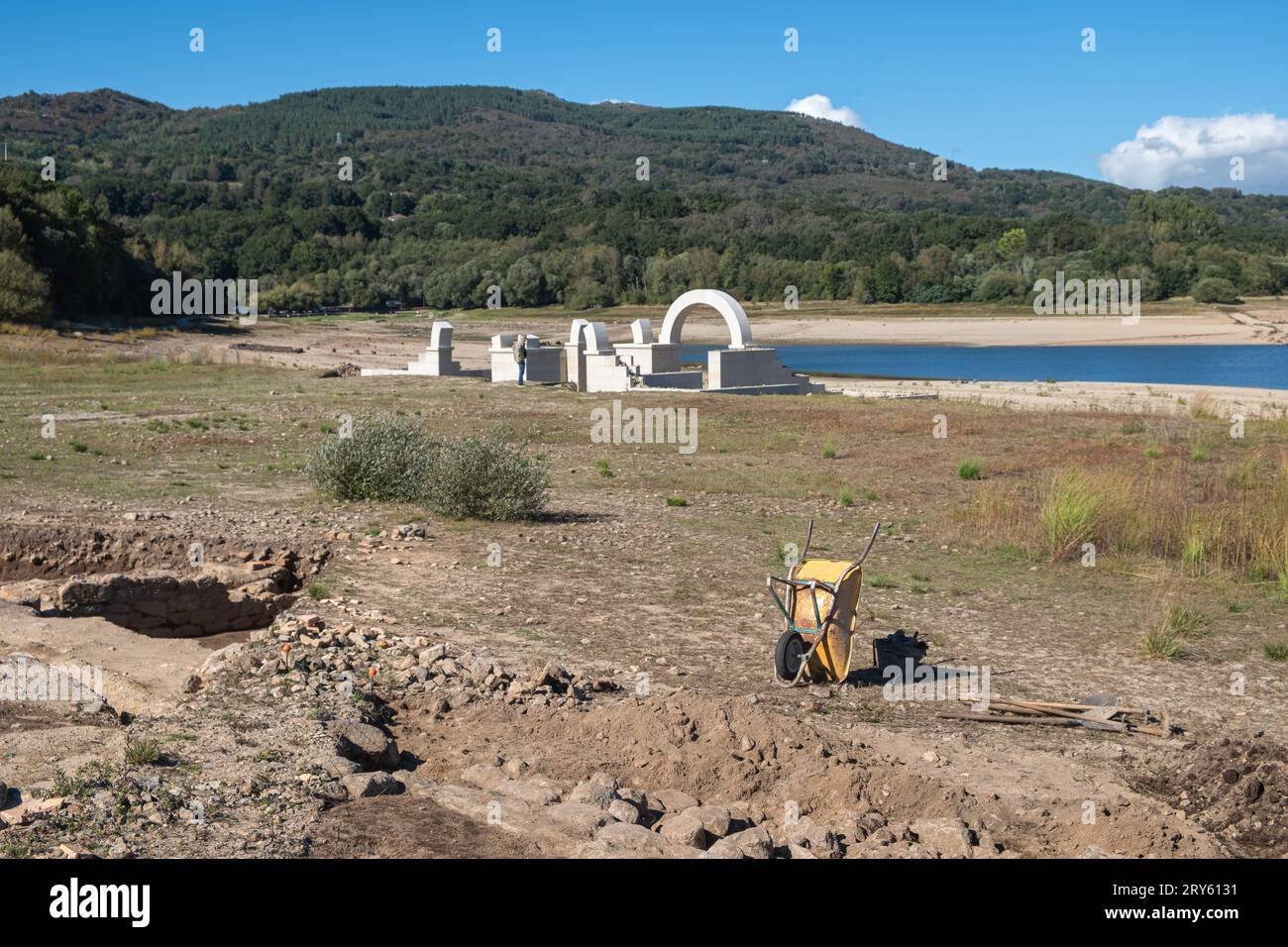 Roman ruins with lake. Aquis Querquennis archaeological site, arched stone door. Baños de Bande, Orense, Spain. Stock Photo