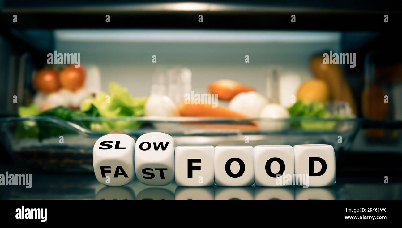 Symbol for the decision of having fast food or slow food. Stock Photo