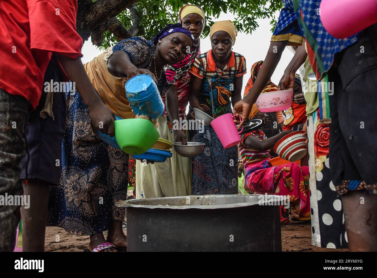 A woman serving nutritional food to the people who attend the health