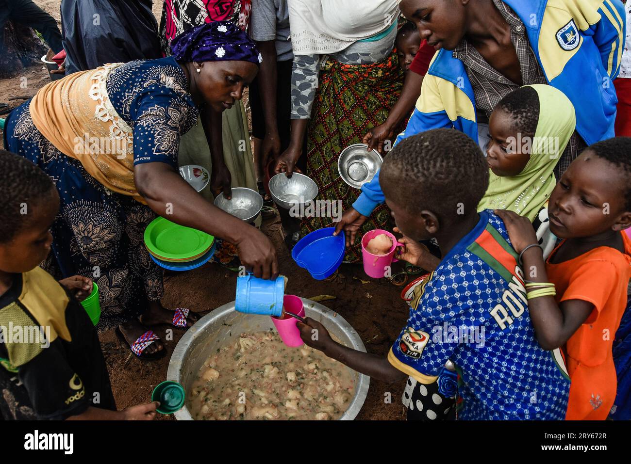 A woman serving nutritional food to the people who attend the health