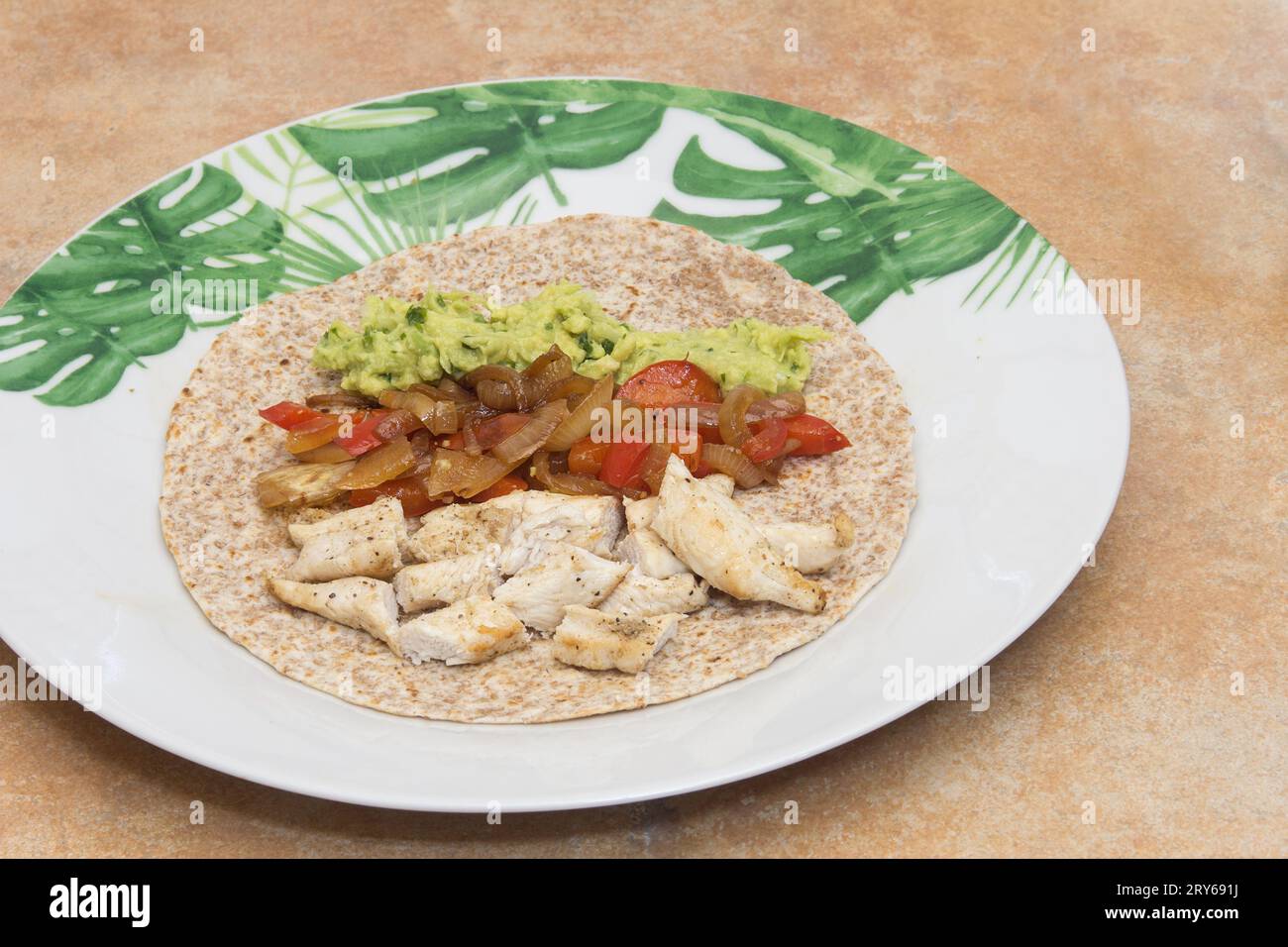 Delicious Unrolled Whole Wheat Chicken Fajita Tortilla with cumin