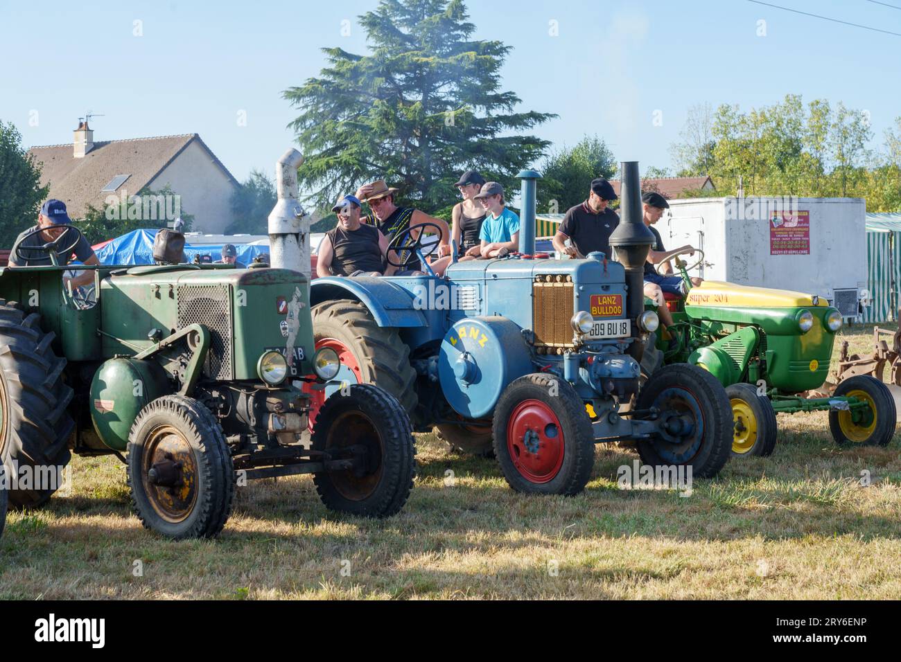 Vintage farming machinery on display at a harvest festival in France Stock Photo