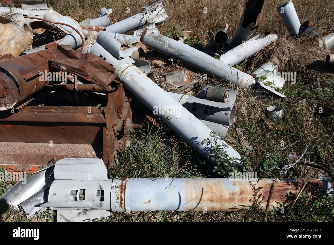 LUKASHIVKA, UKRAINE - SEPTEMBER 27, 2023 - The fragments of Russian shells are piled on the ground at the Naporivske Farm that was affected by the she Stock Photo