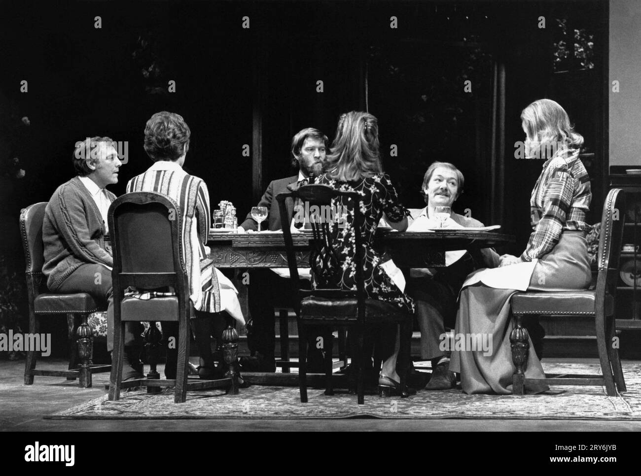 rear, left: Mark Kingston (Reg)  centre: Tom Courtenay (Norman)  right: Michael Gambon (Tom), Penelope Keith (Sarah) in THE NORMAN CONQUESTS - TABLE MANNERS by Alan Ayckbourn at the Globe Theatre, London W1  01/08/1974  design: Alan Pickford  lighting: Nick Chelton  director: Eric Thompson Stock Photo