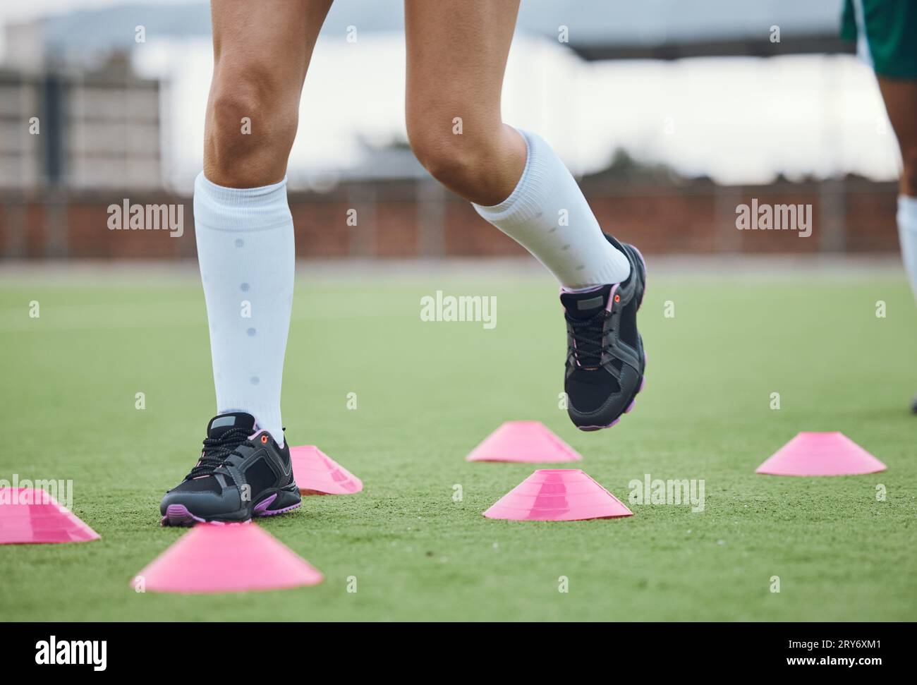 Cone, legs or athlete running in training, workout and warm up exercise