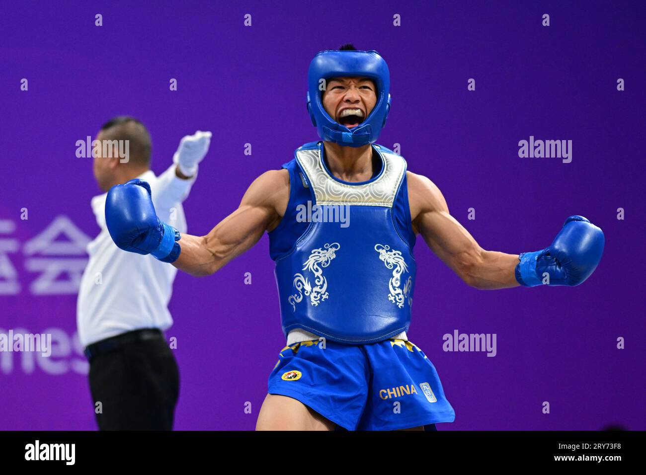 Hangzhou, China. 29th Sep, 2023. Jiang Haidong of China competes against Arnel Mandal( not pictured) of the Philippines during the Asian Games 2023, Wushu Sanda Men's 56Kg Final match at Xiaoshan Guali Sports Centre. Jiang won the match by point difference. Credit: SOPA Images Limited/Alamy Live News Stock Photo